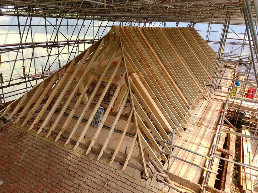 carpenter building wooden roof